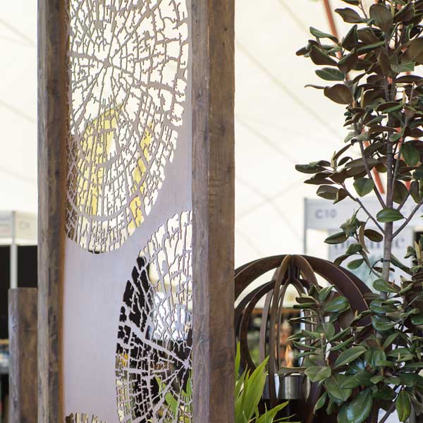 Boodle Concepts - tree rings laser cut steel garden privacy screen in Melbourne, Kyneton